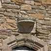 S range of steading, detail of re-used corbel above window in S gable