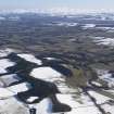 General oblique aerial view of the Tweed with Lilliesleaf in the middle distance and the snow covered Cheviots beyond, looking ESE.