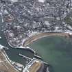 General oblique aerial view of Eyemouth, centred on the harbour, taken from the NE.