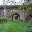 View from North along remnant of wagonway/railway track bed. Note modern strengthening of this c.1830 bridge.
