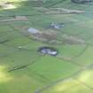 Oblique aerial view centred on the farmhouse, taken from the SE.