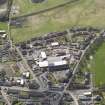 General oblique aerial view of Tillicoultry, centred on Paton's Mill, taken from the N