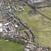 General oblique aerial view of Tillicoultry, centred on Hareburn Road, with Paton's Mill to left, taken from the W