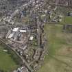 General oblique aerial view of Tillicoultry, centred on Hareburn Road and Paton's Mill, taken from the SW