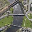 Oblique aerial view of  the bridges across the River Forth at Causewayhead, taken from the NW.