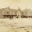 View of Huntly Arms Hotel, Aboyne with three carriages outside
Titled: 'Huntly Arms Hotel. 205. E G.'
