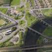 Oblique aerial view of the city centred on the Customs Roundabout, taken from the E.