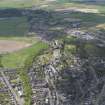 General oblique aerial view of the city centred on the castle, taken from the SE.