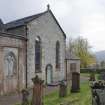 View of the North elevation of Church of St Munn's taken from North-East. Part view of adjoining Argyll Mausoleum.