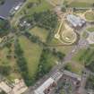 Oblique aerial view of the parchmarks of the air raid shelters at Glasgow Green, looking NW.