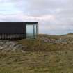 View of the Northern end of the East elevation of An Turas waiting room, Gott Bay, Tiree.