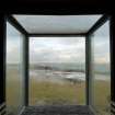 Interior view of the glazed box section of An Turas waiting room, Gott Bay, Tiree, taken from the South-East. The is the enclosed viewing area of the waiting room.