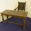 Interior. Carved memorial table and chair. Detail