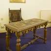 Interior. Carved memorial table and chair. Detail