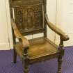 Interior. Carved memorial chair. Detail