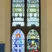 Interior. Side wall. Stained glass window. Detail