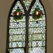 Interior. Side wall. Stained glass window. Detail