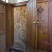 Interior. Tower lobby. War memorial wall panel and tower stair doorway.Detail