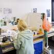 View of students working within the textiles department studio spaces within Newbery Tower