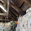 Interior view of the traditional cottage in Balemartine, Tiree. Detail view of the roof construction, set on the inner face of the wallhead.