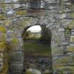Detail view of  the arched opening in the Western gable of Kirkapol Old Parish Church and Churchyard, Tiree, taken from the West.