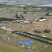 Oblique aerial view of T in the Park, looking to the E.