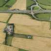 Oblique aerial view of the cropmarks of the rig, looking to the NNW.