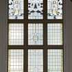 Interior. Main hall.  Balcony.  Detail of stained glass window on east wall.