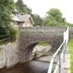 General view of bridge over the sluice leading from the leading the dam, from NW.