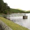 Detail of pump station and access bridge Glencorse dam, from NW.