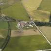 Oblique aerial view of the agricultural show at Rannachy with Rathven Station beyond, looking to the NNW.