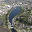 Oblique aerial view of the Caledonian Canal centred on the Muirtown Basin in Inverness, looking to the SE.