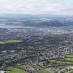 General oblique aerial view of Inverness with the Beauly Firth and Kessock Bridge beyond, looking to the N.