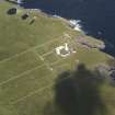 Oblique aerial view of the Muckle Skerry lighthouse, taken from the ESE.