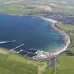 General oblique aerial view of Thurso looking across the bay with Scrabster in the foreground, taken from the WNW.