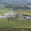 Oblique aerial view of Dalcross Airfield, Inverness, looking S.