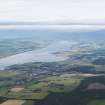 General oblique aerial view of the Cromarty Firth with Alness in the middle distance, looking WSW.