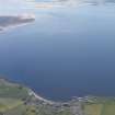 General oblique aerial view with Portmahomack in the foreground and the Dornoch Firth beyond, looking NNW.