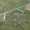 Oblique aerial view of Tain Airfield centered on the technical site, looking N.