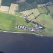 Oblique aerial view of the Glenmorangie Distillery, looking SW.