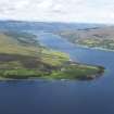 General oblique aerial view of Undrayian Point with the Kyles of Bute beyond, looking to the NW.