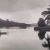 View of Rosehall Loch showing man in rowing boat
Titled: 'Rosehall Loch'
PHOTOGRAPH ALBUM No.16: EWING GILMORE ALBUM.
