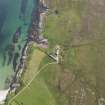 Oblique aerial view of Walkers Cottage, Caoles, Coll, looking to the S.