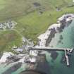 Oblique aerial view of the pier and ferry terminal at Scarinish, Tiree, looking to the W.
