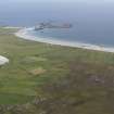General oblique aerial view of Ruaig, Kirkapol and Traigh Mor, Tiree, looking to the SE.