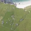 Oblique aerial view of Balevullin, Tiree, looking to the NW.