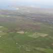 General oblique aerial view of Balevullin and Kilmoluaig on Tiree, looking to the ENE.