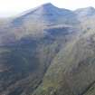 Oblique aerial view of Ben More looking up Gleann Dubh with Dun Breac fort in the foreground, looking to the NNW.