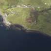 Oblique aerial view of Port na Cagain harbour, looking N.