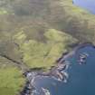 Oblique aerial view of the field system, lazy beds and head dyke at Ramasaig, looking S.